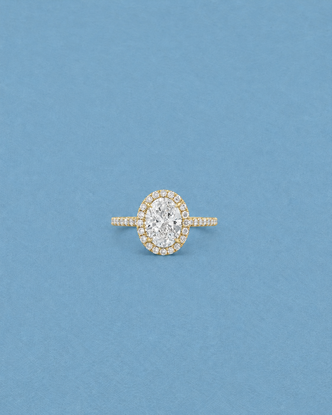 Oval Halo Ring in Yellow Gold